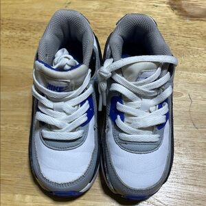 Nike Kids White and Gray Sneakers with Blue Accents